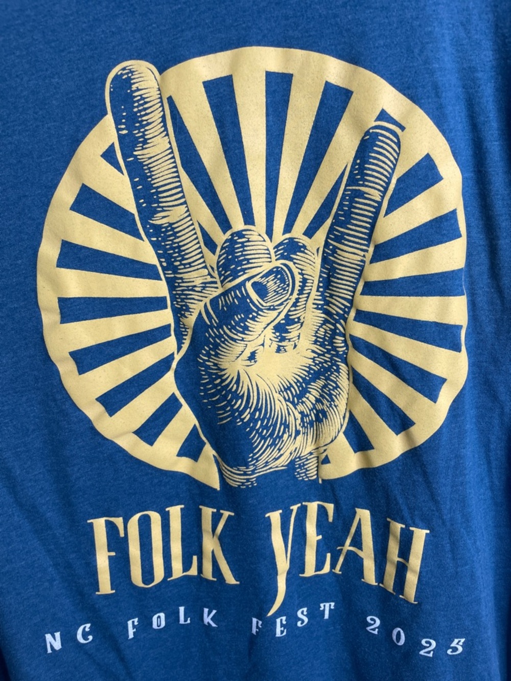 Bella Canvas Blue Folk Fest Graphic Tee with Yellow Print